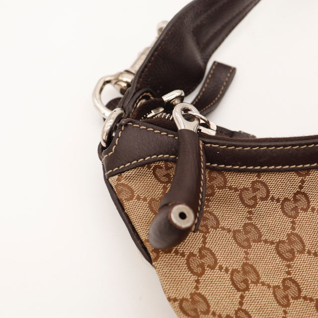 Vue du fond Gucci Hobo toile monogrammée beige et ébène occasion authentique — AMANA Vintage