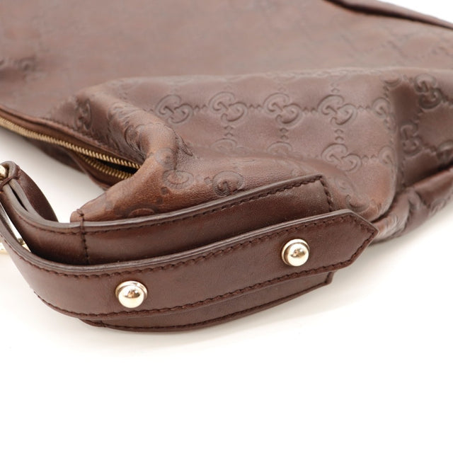 Détail du zip Gucci Hobo Horsebit cuir Guccissima marron occasion authentique — AMANA Vintage