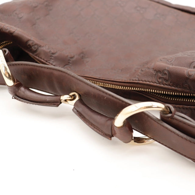 Vue de profil Gucci Hobo Horsebit cuir Guccissima marron occasion authentique — AMANA Vintage