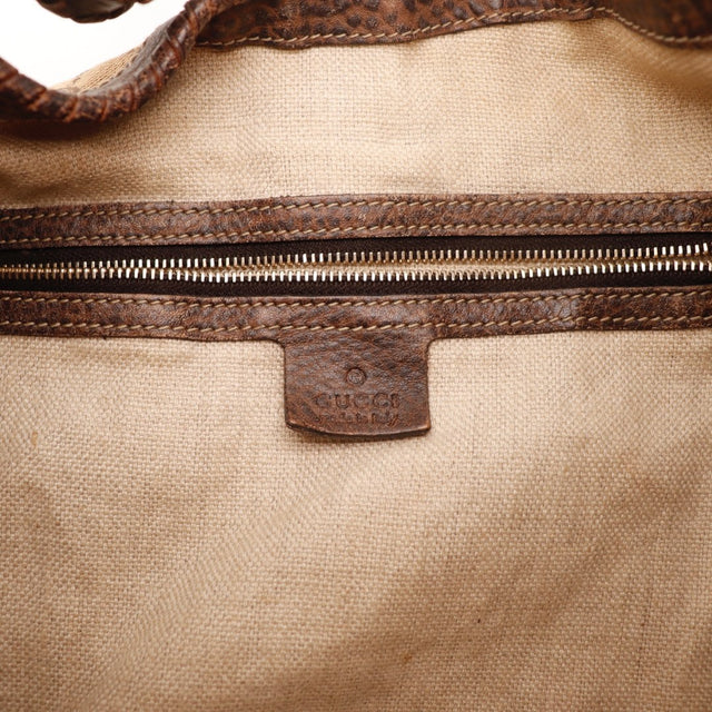 Vue de profil Gucci New Jackie toile monogrammée beige et marron occasion authentique — AMANA Vintage