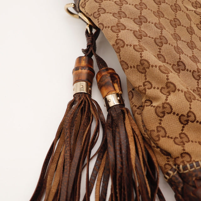 Détail de l'anse Gucci New Jackie cuir marron occasion authentique — AMANA Vintage