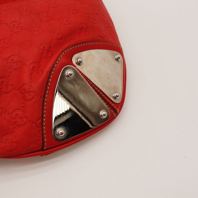 Vue de profil Gucci Indy Hobo cuir Guccissima rouge occasion authentique — AMANA Vintage