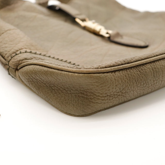Détail coin inférieur Gucci New Jackie cuir kaki légers frottements — AMANA Vintage