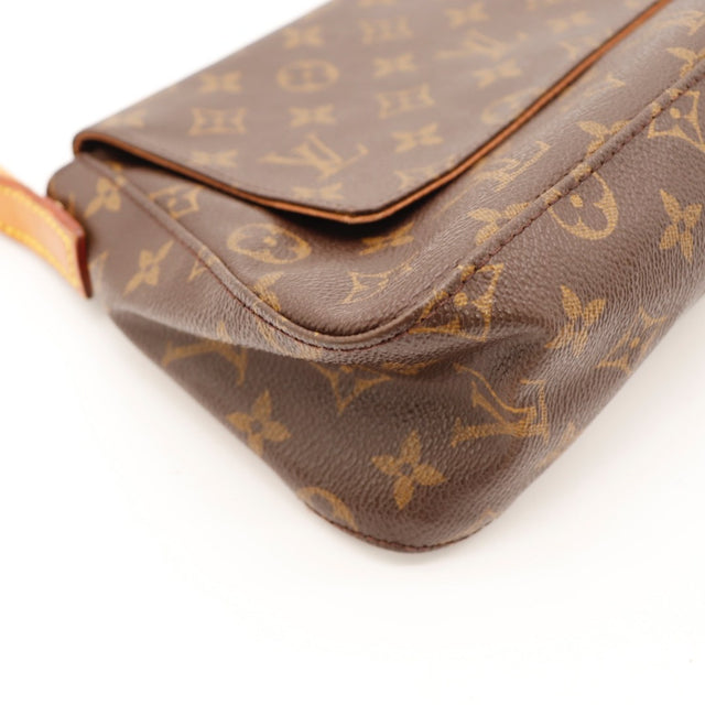 Détail des surpiqûres Louis Vuitton Mini Looping Toile Monogramme occasion authentique — AMANA Vintage