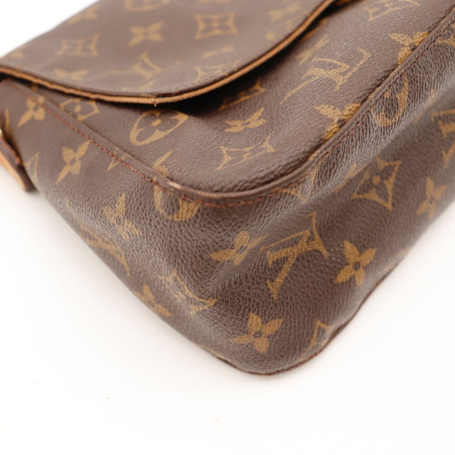 Vue de côté Louis Vuitton Mini Looping Toile Monogramme occasion authentique — AMANA Vintage