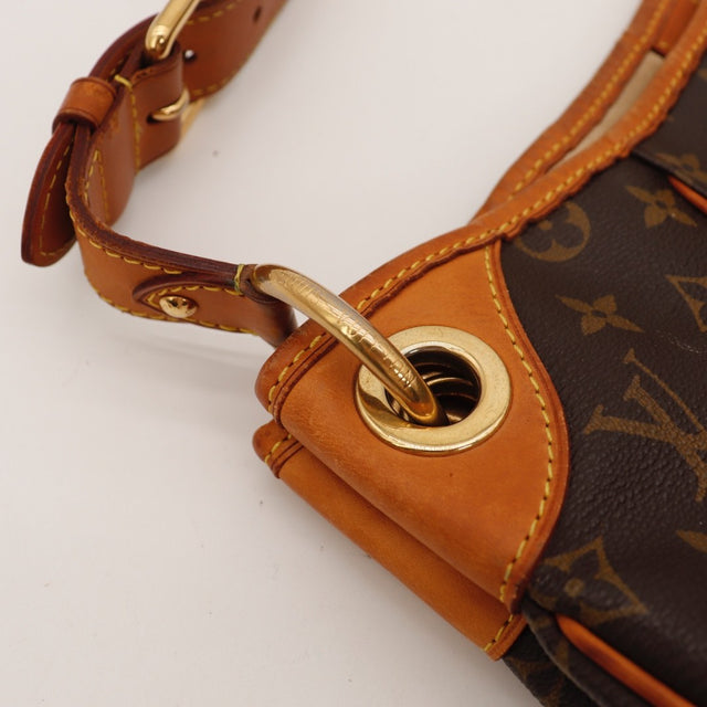 Détail des coutures latérales Louis Vuitton Galliera PM Toile Monogramme occasion authentique — AMANA Vintage