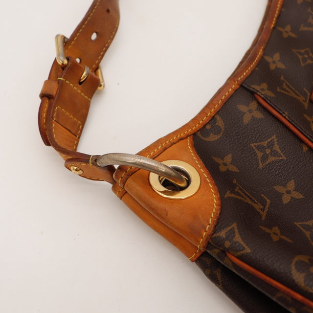 Détail des bordures en cuir Louis Vuitton Galliera PM Toile Monogramme occasion authentique — AMANA Vintage