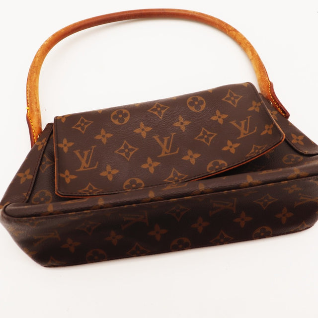 Coins inférieurs Louis Vuitton Mini Looping Toile Monogramme occasion authentique — AMANA Vintage