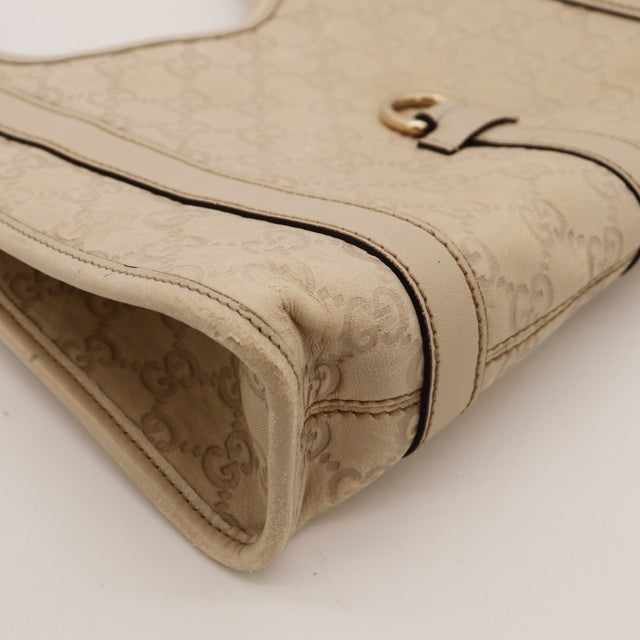 Détail de l'étiquette intérieure Gucci Hobo cuir Guccissima beige occasion authentique — AMANA Vintage