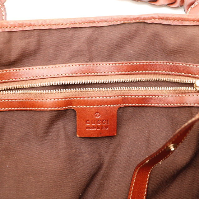 Vue de profil du sac Gucci Hobo Pelham beige et ébène occasion authentique — AMANA Vintage