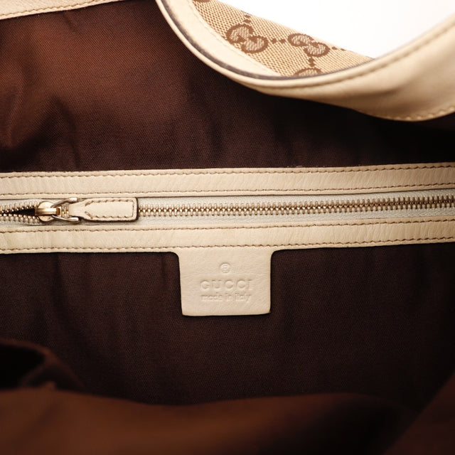 Vue d'ensemble Gucci Hobo Horsebit toile monogrammée beige et marron occasion authentique — AMANA Vintage