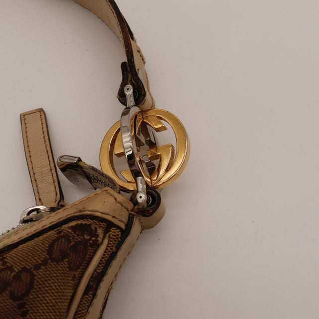 Détail de la fermeture zippée Gucci Hobo Interlocking G occasion authentique — AMANA Vintage