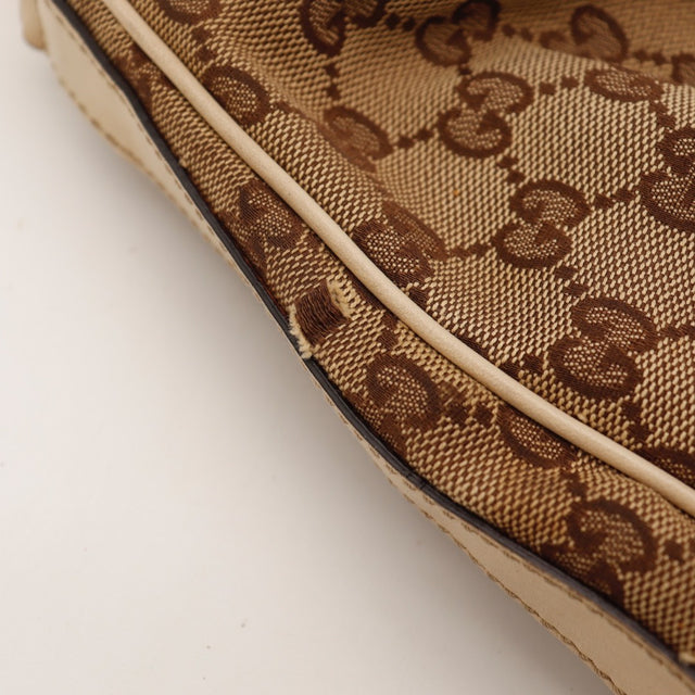 Vue du fond Gucci Hobo Interlocking G toile monogrammée beige occasion authentique — AMANA Vintage
