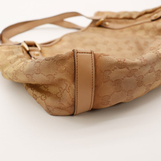 Detail base et coins Gucci Tote Horsebit canvas GG beige — AMANA Vintage
