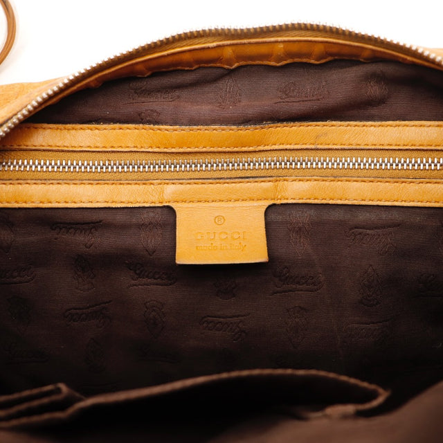 Détail du motif embossé Gucci Hobo cuir Guccissima occasion authentique — AMANA Vintage