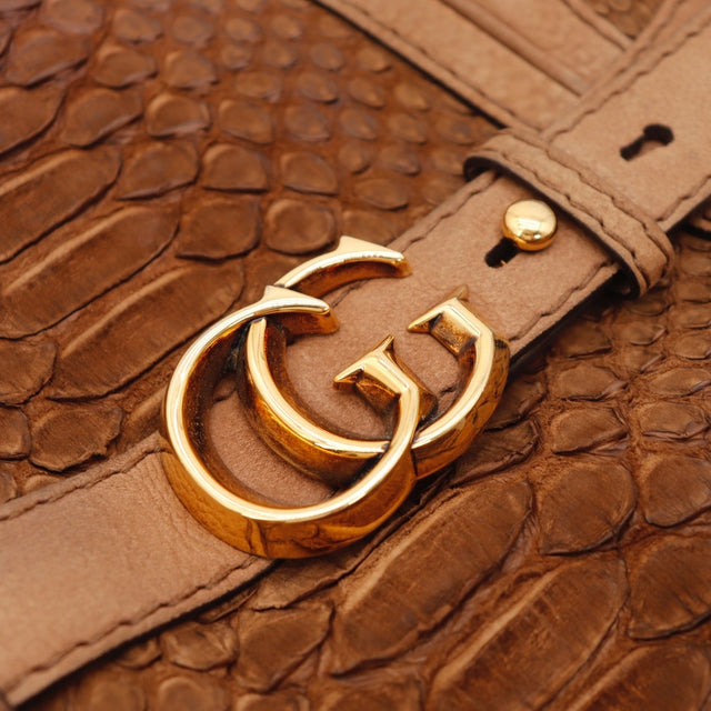 Détail du zip doré Gucci Hobo python marron — AMANA Vintage