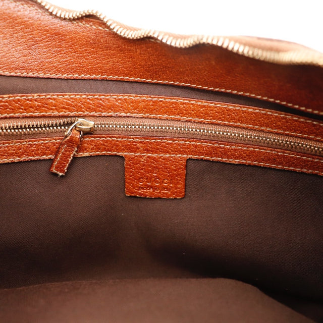 Détail des coutures Gucci Hobo Bambou toile monogrammée marron occasion authentique — AMANA Vintage
