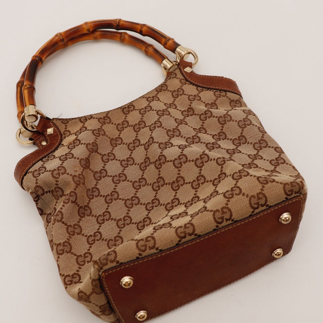 Détail du fond Gucci Bambou cuir marron occasion authentique — AMANA Vintage