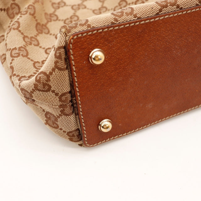 Détail de l'argenterie dorée Gucci Bambou occasion authentique — AMANA Vintage