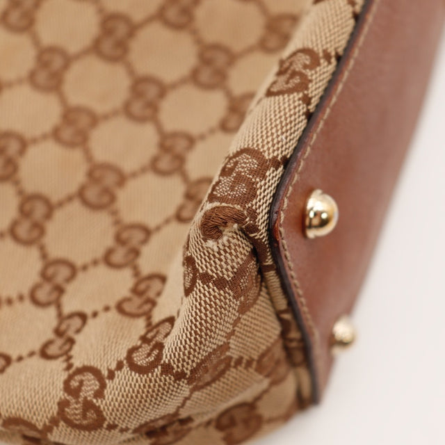 Vue d'ensemble Gucci Bambou toile monogrammée beige et cuir occasion authentique — AMANA Vintage