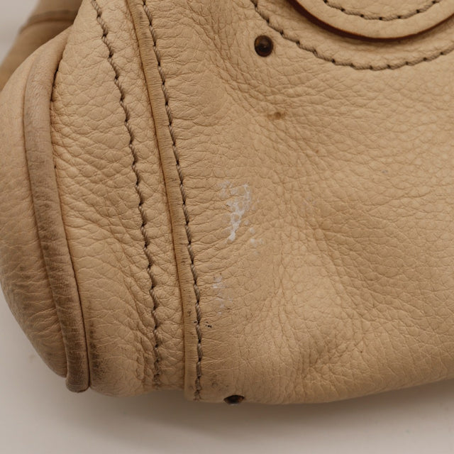 Détail du zip Chloé Paddington cuir de veau grainé beige occasion authentique — AMANA Vintage