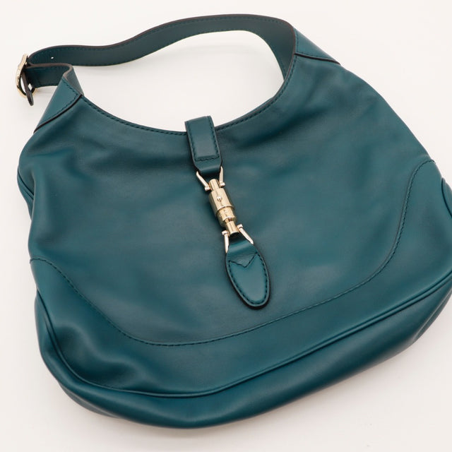Détail des bordures Gucci New Jackie cuir lisse bleu canard occasion authentique — AMANA Vintage