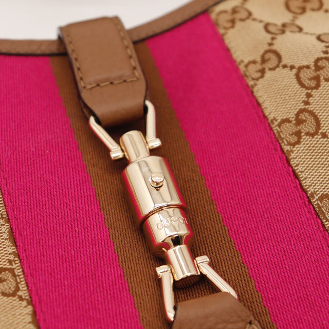 Vue des coins inférieurs Gucci New Jackie cuir grainé marron occasion authentique — AMANA Vintage