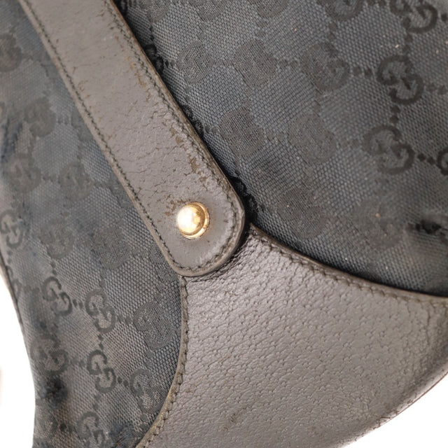 Détail des coutures latérales Gucci Hobo Bambou noir occasion authentique — AMANA Vintage