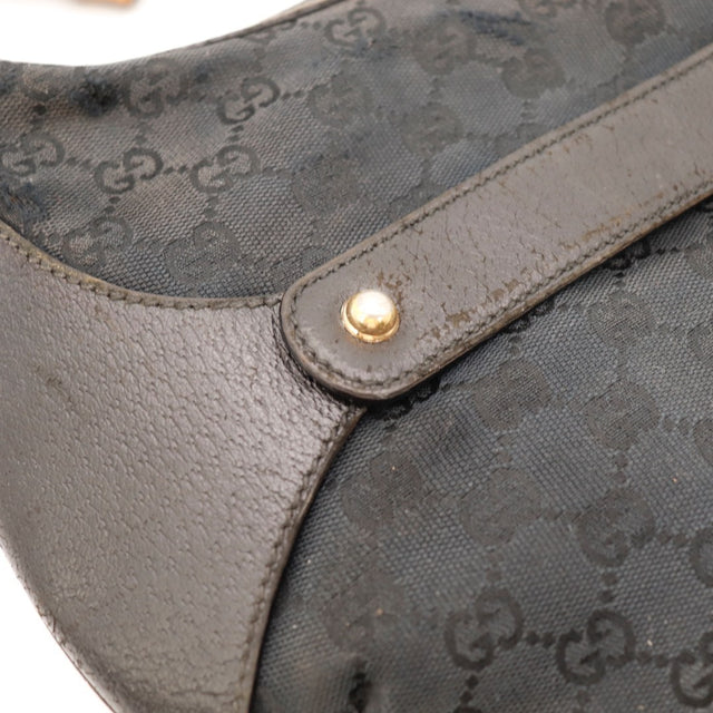 Détail de l'argenterie dorée Gucci Hobo Bambou noir occasion authentique — AMANA Vintage