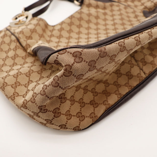 Vue du fond Gucci Hobo Charlotte toile monogrammée beige et ébène occasion authentique — AMANA Vintage
