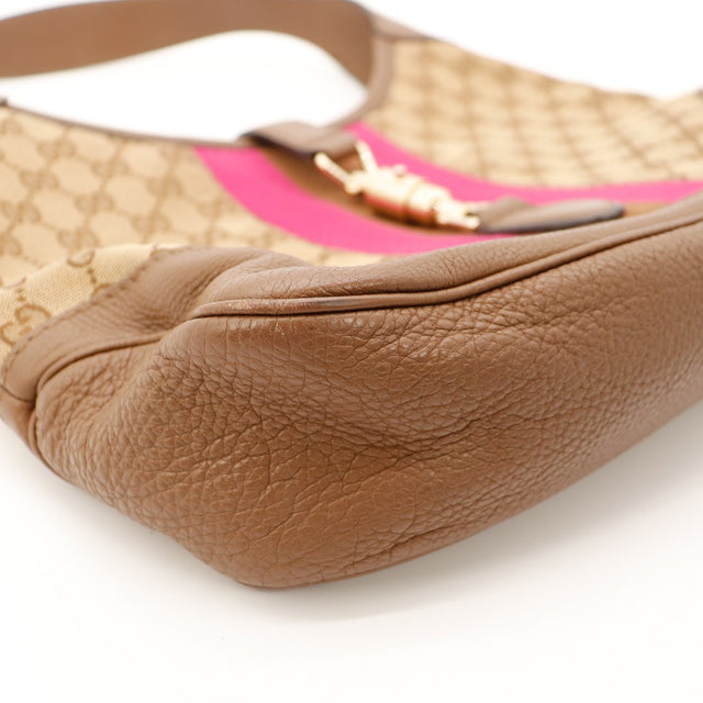 Détail coins inférieurs cuir grainé Gucci New Jackie légers frottements — AMANA Vintage