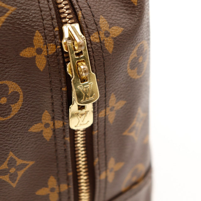 Détail tirette et argenterie dorée Louis Vuitton Deauville — AMANA Vintage