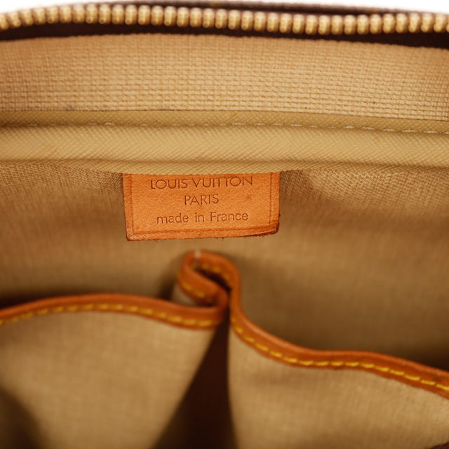Détail intérieur toile beige et étiquette Louis Vuitton Paris Deauville — AMANA Vintage