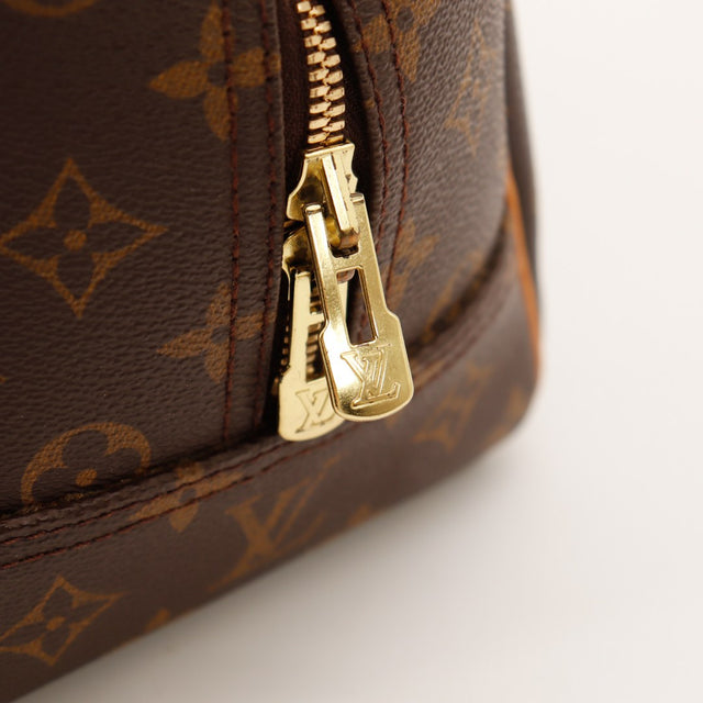 Détail tirette zippée dorée logo LV Deauville — AMANA Vintage