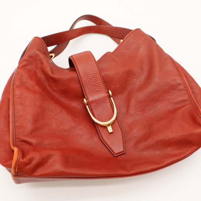 Détail anses Gucci Hobo Stirrup cuir rouge occasion authentique — AMANA Vintage