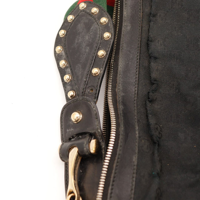 Détail anse cloutée et zip Gucci Hobo occasion authentique — AMANA Vintage
