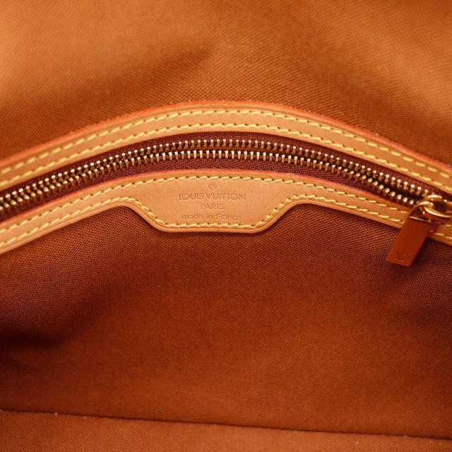 Intérieur Louis Vuitton Mini Looping signature Louis Vuitton Paris occasion authentique — AMANA Vintage