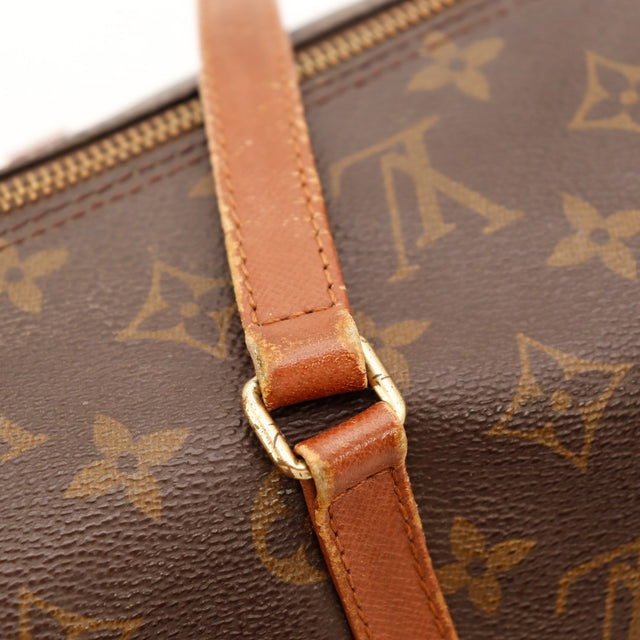 Détail attache anse et argenterie dorée Louis Vuitton Papillon 30 — AMANA Vintage