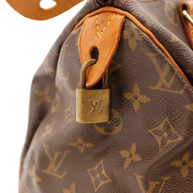 Détail cadenas et attache anse Louis Vuitton Speedy 30 — AMANA Vintage
