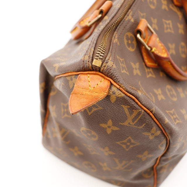 Detail coin et tab cuir vachette Louis Vuitton Speedy 30 — AMANA Vintage