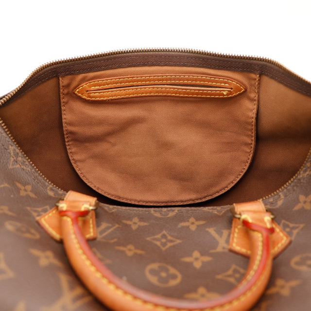 Intérieur du Louis Vuitton Speedy 35 doublure textile et poche — AMANA Vintage