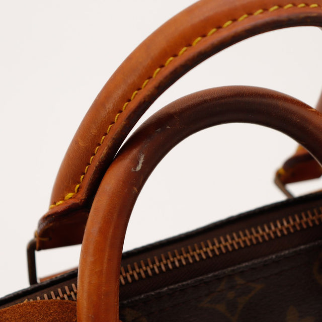 Detail tab fermeture Louis Vuitton Speedy 25 cuir vachette patine — AMANA Vintage