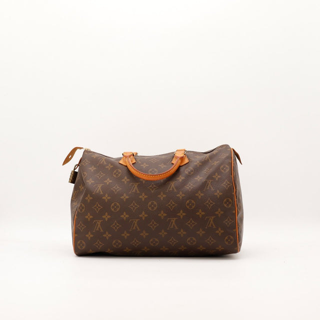 Détail languette cadenas et zip Louis Vuitton Speedy 35 — AMANA Vintage