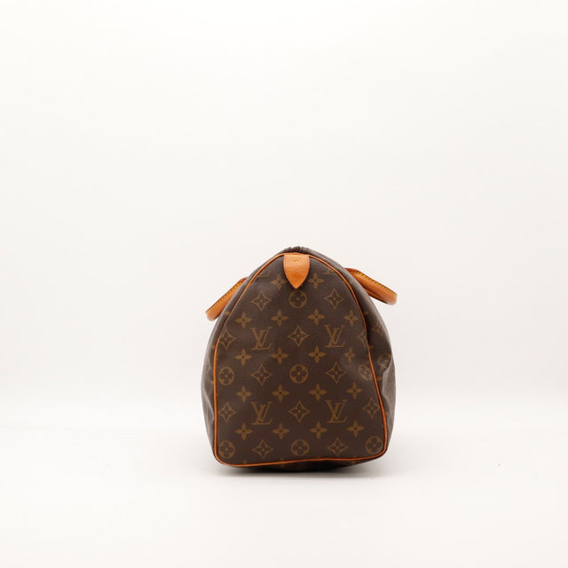 Détail cadenas à combinaison LV Louis Vuitton Speedy 35 — AMANA Vintage