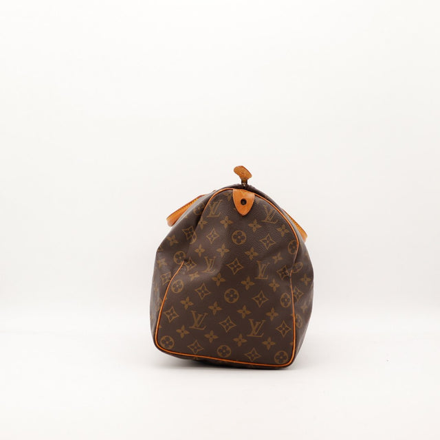 Vue de profil Louis Vuitton Speedy 40 toile Monogram côté droit — AMANA Vintage