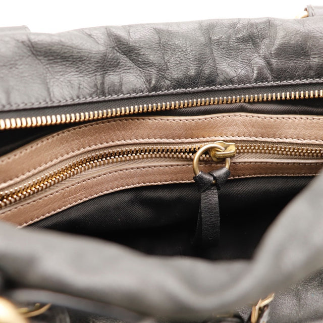 Détail des anses Chloé Bay cuir de veau glacé noir occasion authentique — AMANA Vintage
