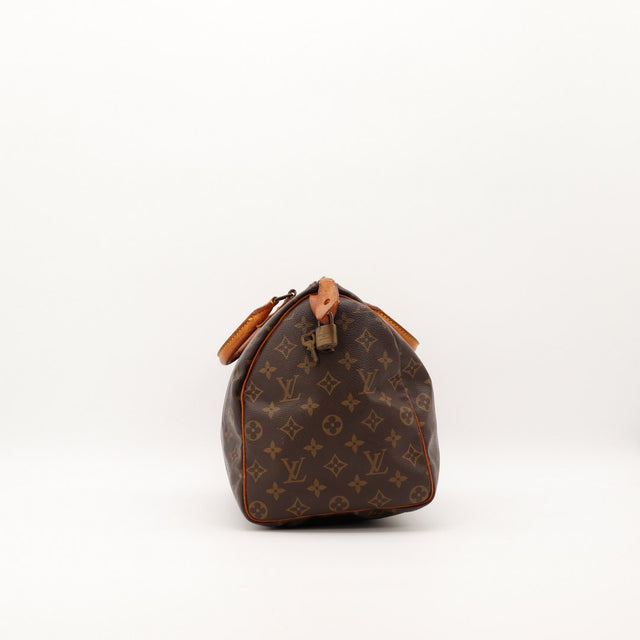 Louis Vuitton Speedy 30 vue de côté gauche avec cadenas et clé inclus — AMANA Vintage
