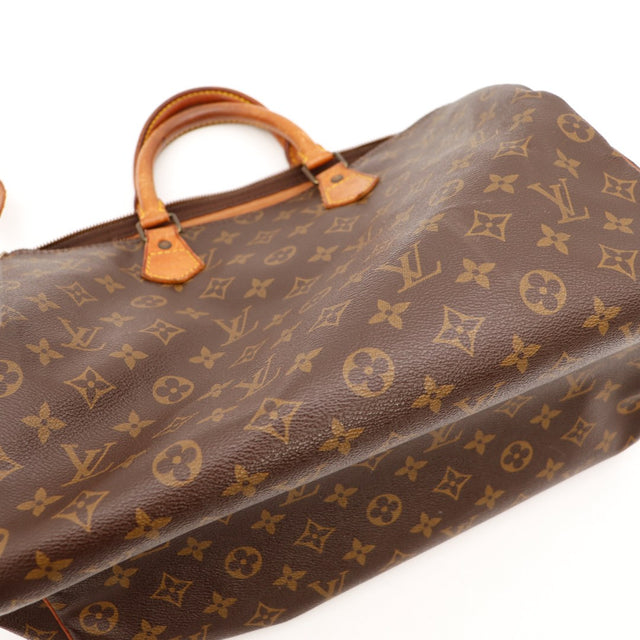 Détail anses cuir vachette Louis Vuitton Speedy 30 patine caramel — AMANA Vintage