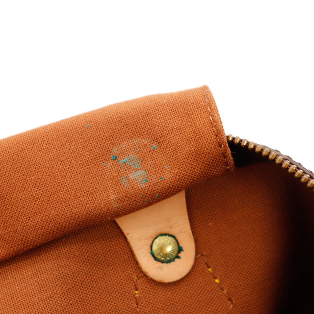 Détail intérieur Louis Vuitton Speedy 30 taches turquoise sur doublure — AMANA Vintage