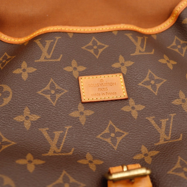 Détail de l'argenterie Louis Vuitton Saumur 30 Toile Monogramme occasion authentique — AMANA Vintage